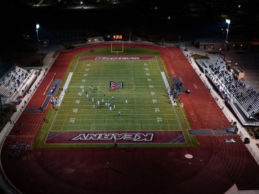 Aerial view of Kearny High School's football stadium during a night game